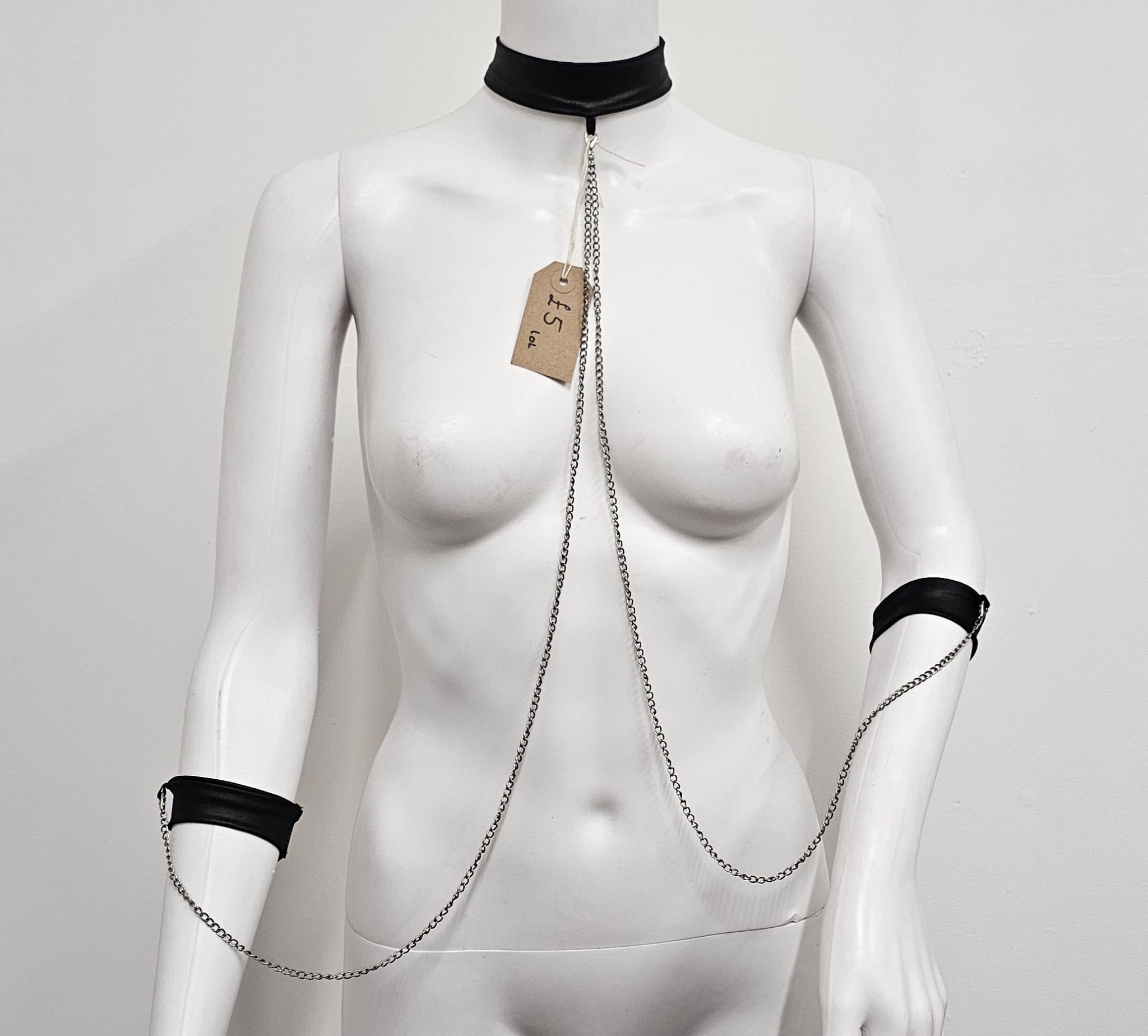 Neck to arm restraints